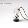 Tiny panda in a bottle necklace