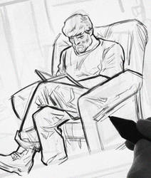 Sketch of a man reading a book