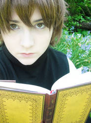 Syaoran-Reading in the sun