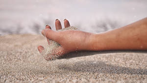 Sand hand