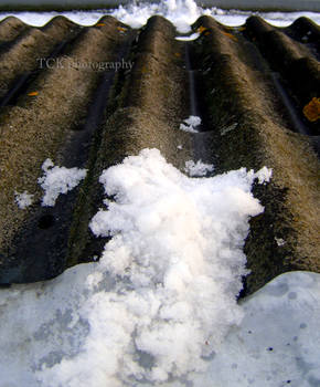 Snow's falling off the roof.