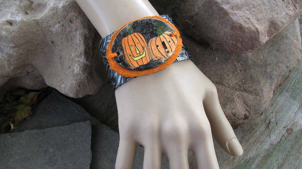Jack-o-lantern leather and ceramic cuff bracelet