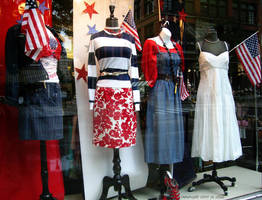 Dresses in a window