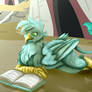 Rovio the griffin reading a book