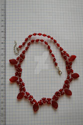 red necklace with leaves