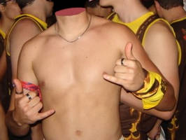 Shirtless boy at party
