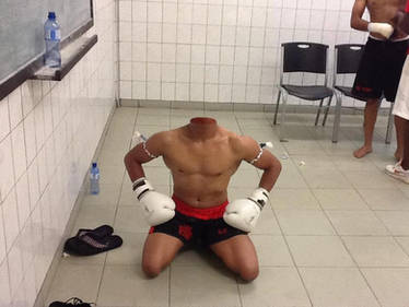 Fighter kneeling on the floor