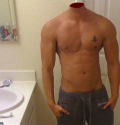 Shirtless guy near the bathroom sink