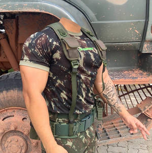 Headless soldier near an army truck