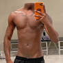 Selfie of headless skinny torso