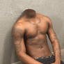 Tattooed male skinny torso relaxing