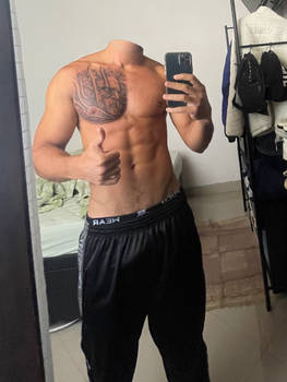 Selfie showing tattoo in male torso