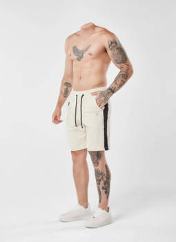 Headless shirtless tattooed man