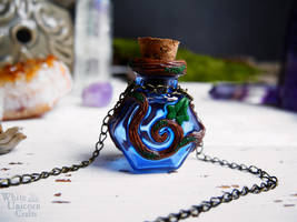 Blue hexagon potion necklace