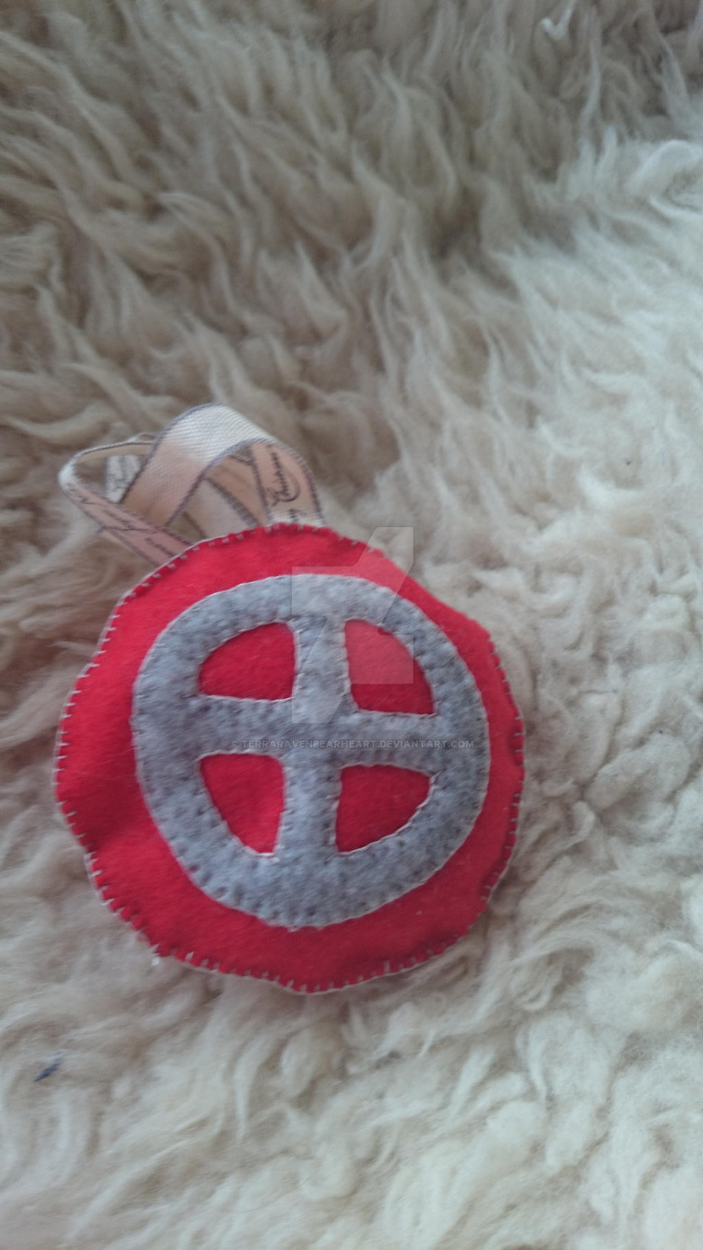 Felt Ornament - Red with sun wheel