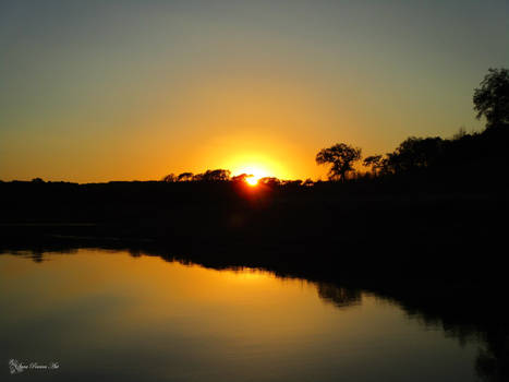 Sunset down the river