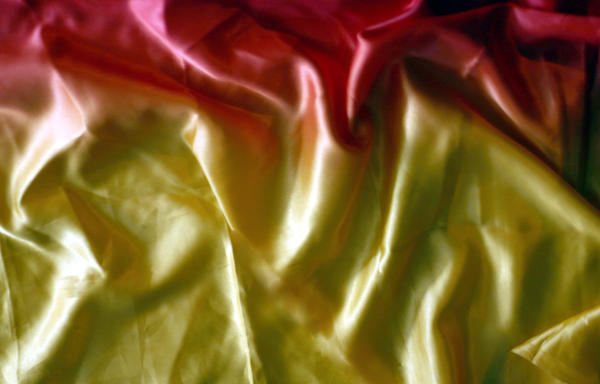 red and yellow satin fabric