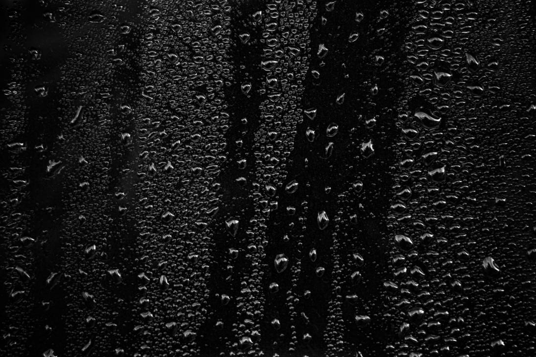 Капли на черном фоне. Капли на стекле. Эффект дождя. Текстура дождя. Дождь на черном фоне.