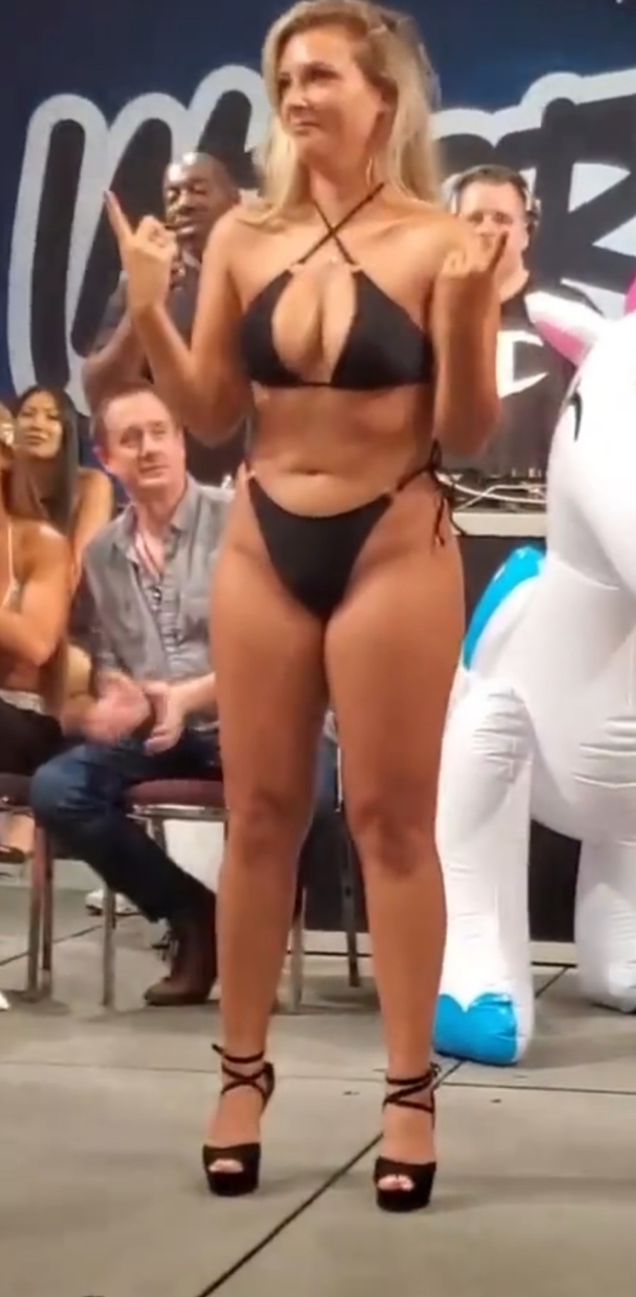 A worried Faith crosses her fingers.