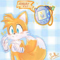 Tails and his blue tamagotchi!