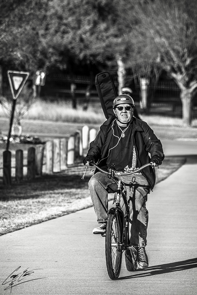 Hardcore Guitar Carrying Biker