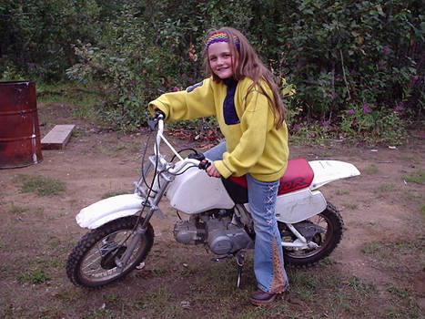 a girl and her dirtbike