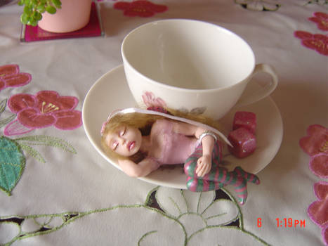 Rose tea cup_ fairy