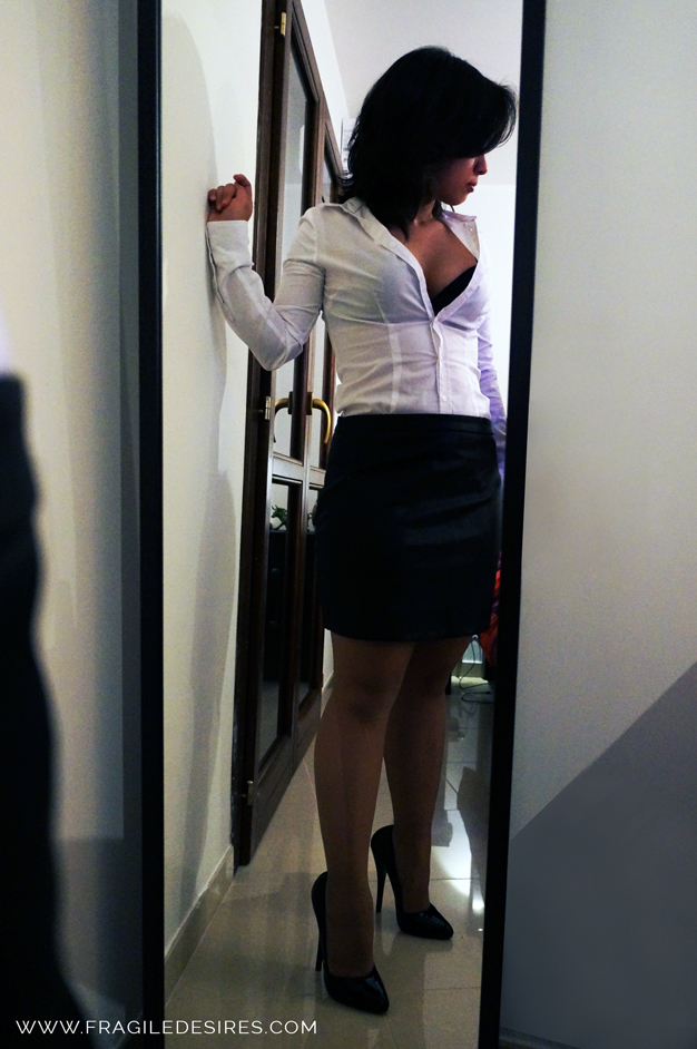 Secretary in leather skirt