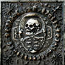 Stone skull and crossbones