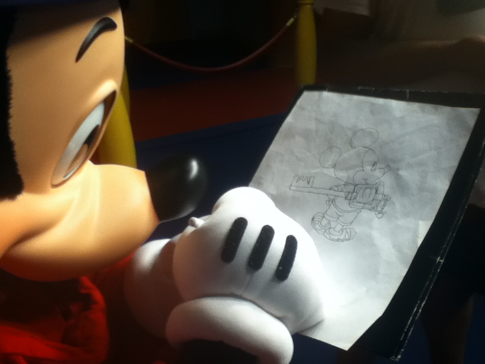 Mickey Mouse signs my drawing