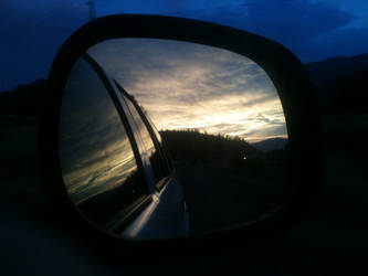 Evening Sunset Through Car Mirror