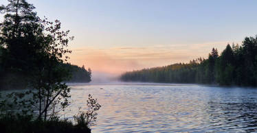 Early Morning Sunrise On The Lake