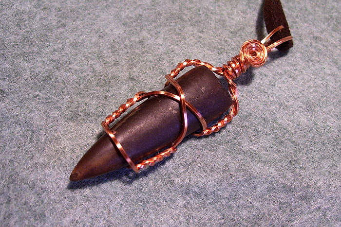 Wire-wrapped belemnite fossil pendant