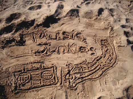 Music Junkies written in sand2