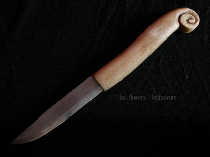 Handcarved knife handle