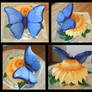 Blue butterfly and flower cake