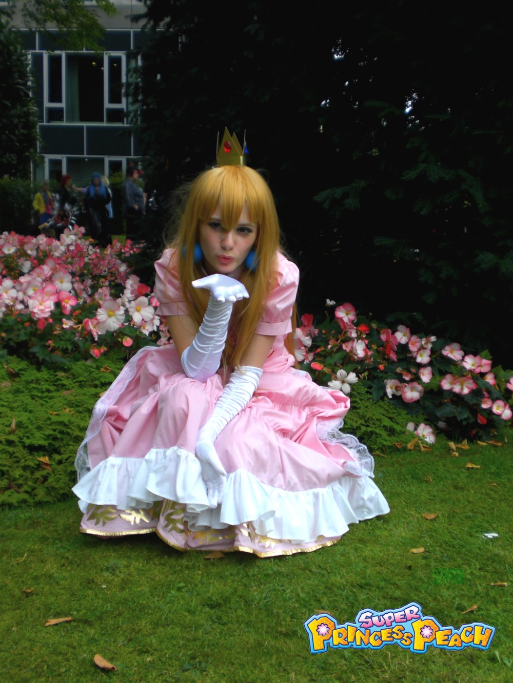 Princess Peach blows kisses