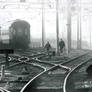 Railway workers in the fog