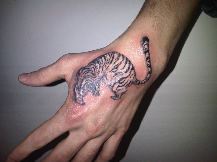 Tiger on Hand tattoo - Kaplan by baranoid on DeviantArt Tiger on Hand tattoo - Kaplan by baranoid on DeviantArt