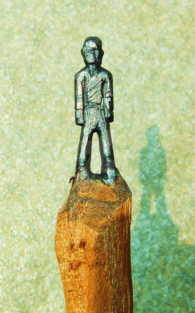 A Pencil Graphite Carved Man