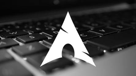 Arch Linux logo with laptop keyboard