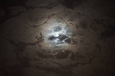 Moon Amidst The Clouds.