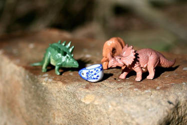 Dinosaurs take tea in woods