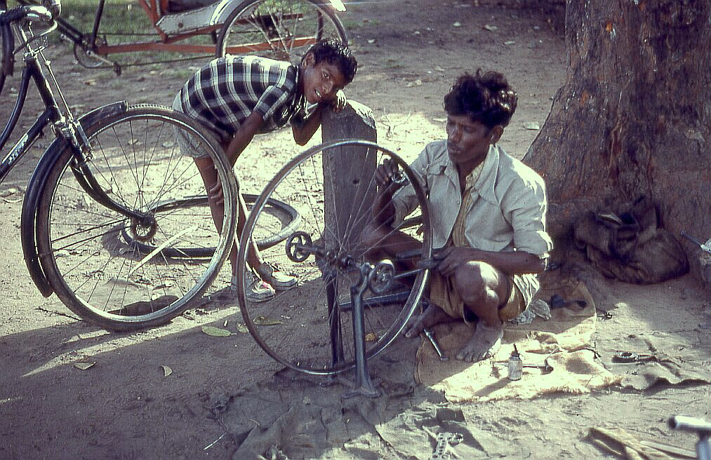 Rickshaw repairman, India