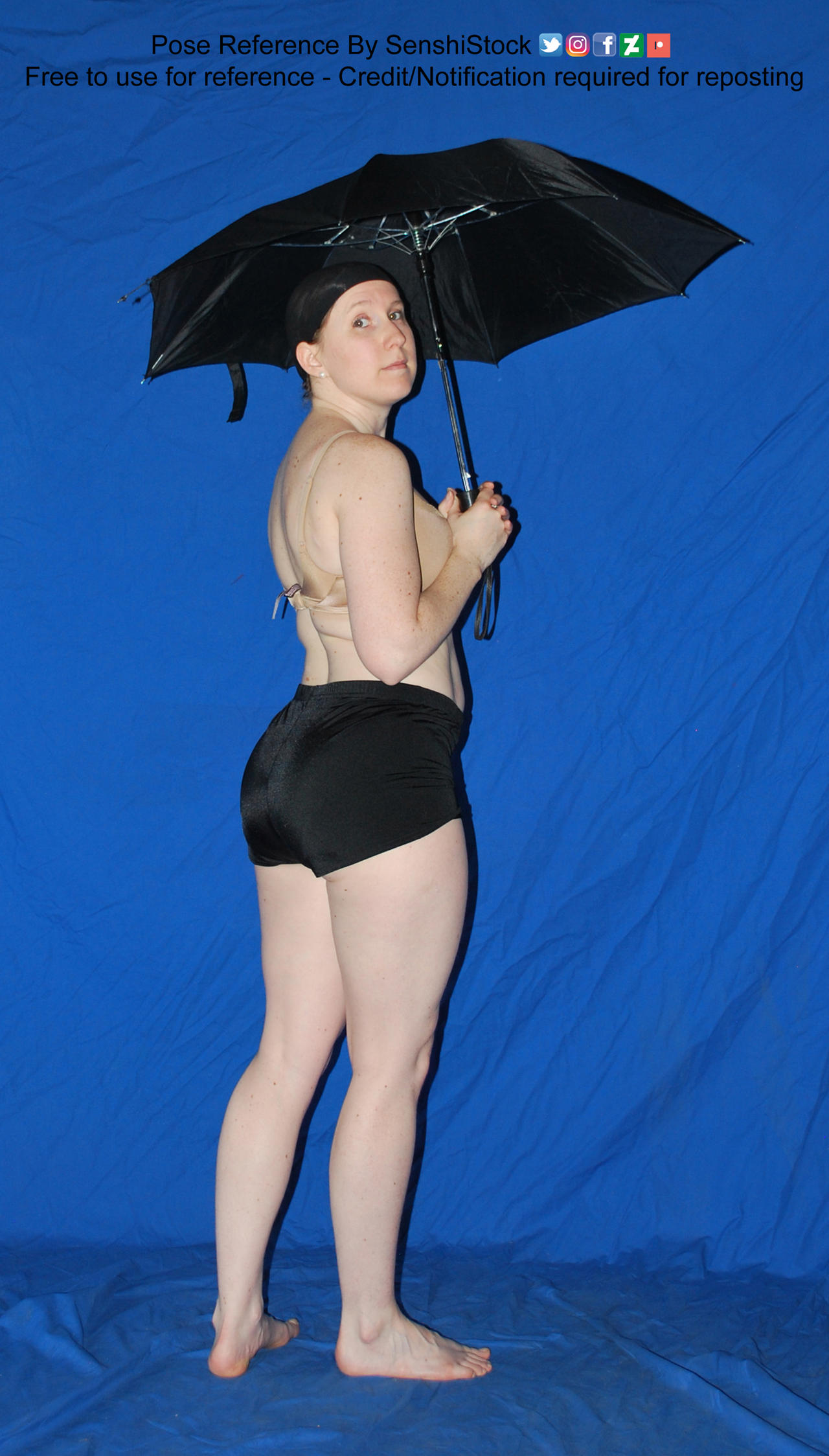 photo Looking Over Shoulder Reference over shoulder rain umbrella pose