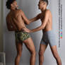 Two Male Models Pushing Pulling Playful Pose Ref