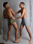 Two Male Models Pushing Pulling Playful Pose Ref by AdorkaStock