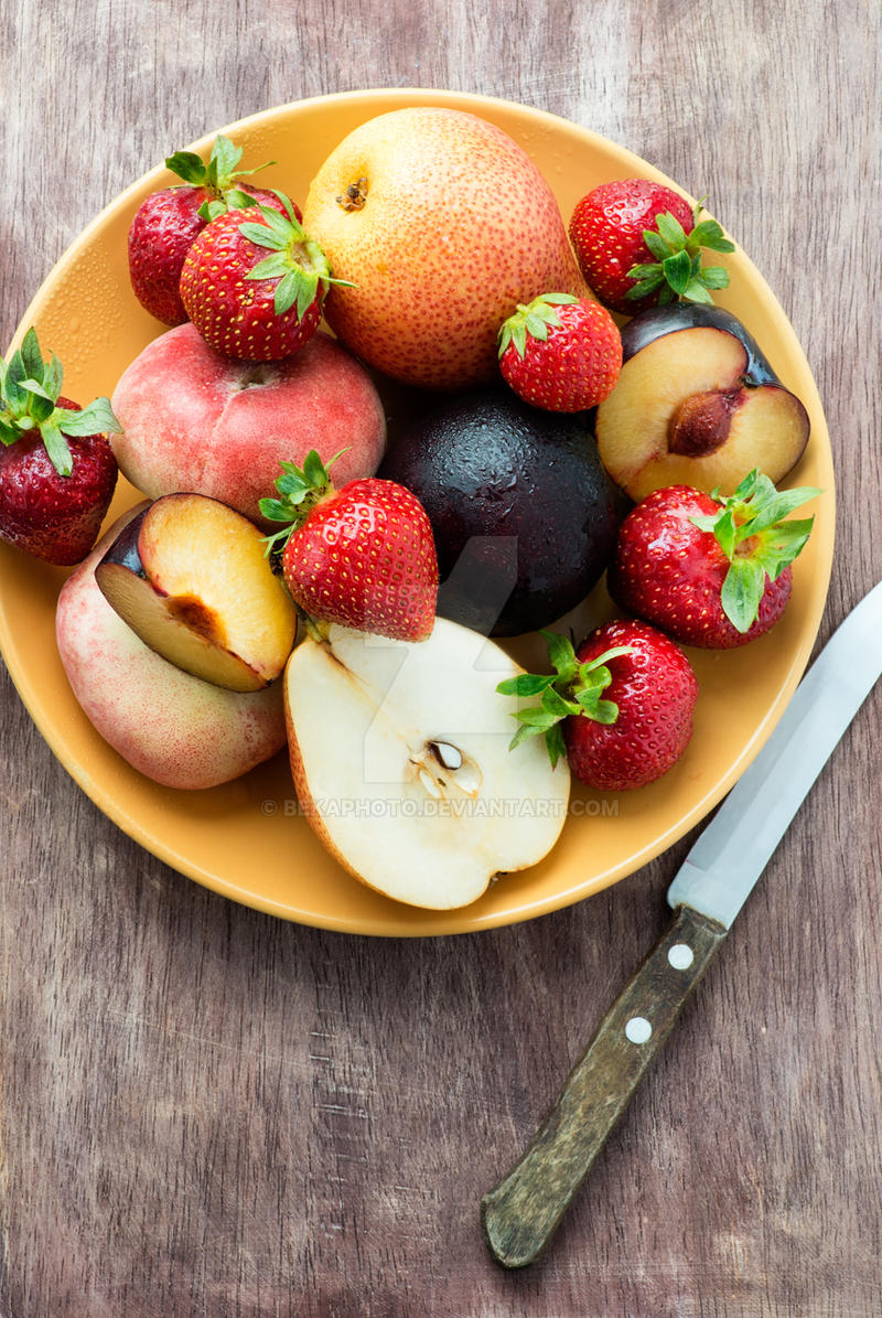 Fresh summer fruits in plate