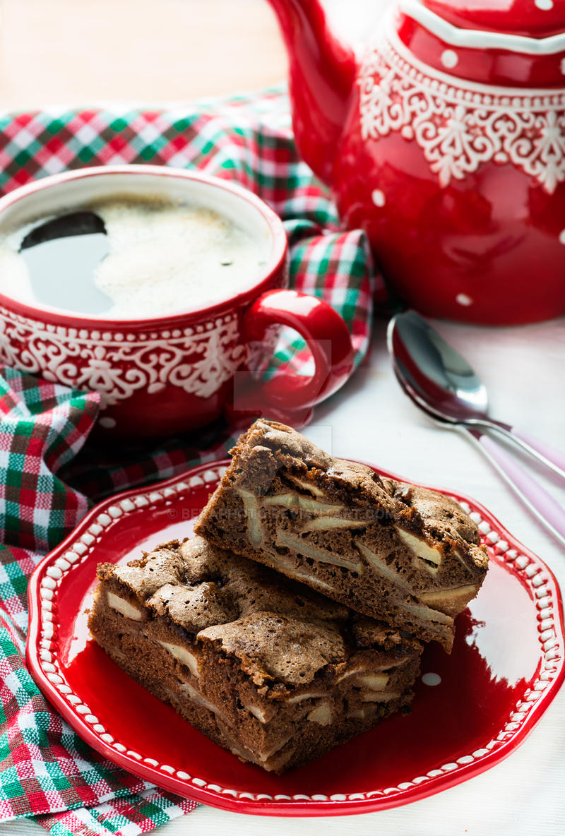 Chocolate pie with apples and cup of coffee