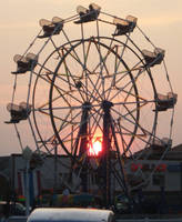 Ferris Wheel By Sunset